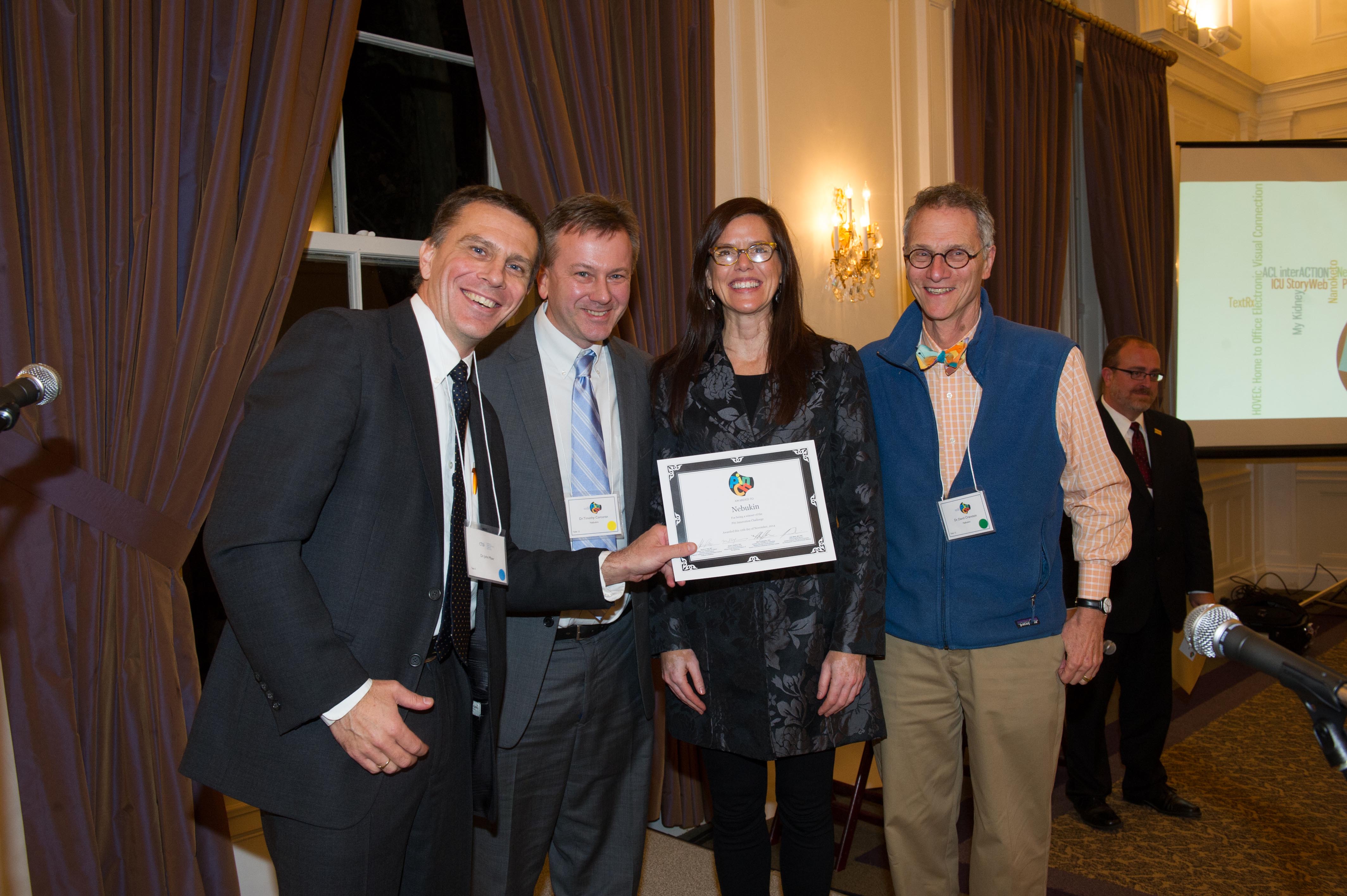 Nebukin team holding award