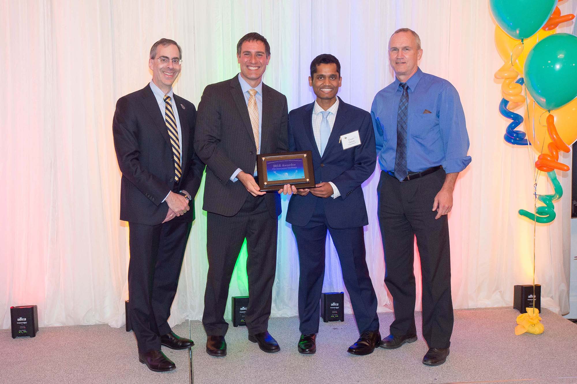 ThreadRite IV team holding award